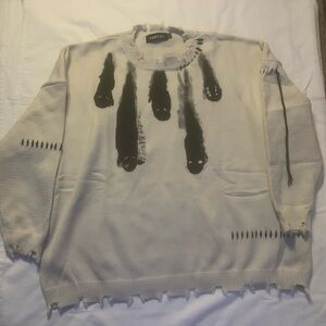 White and black long sleeve ghost sweater